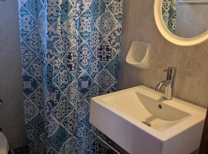 아파트 Tramonto Nel Delfini 키니언